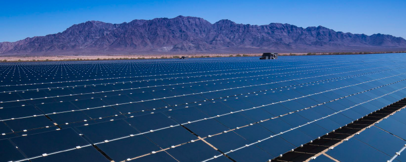 Solar Array by a desert mountain range