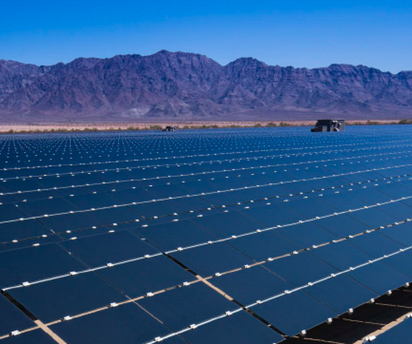 Solar Array by a desert mountain range