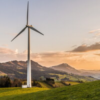 Field with wind turbine